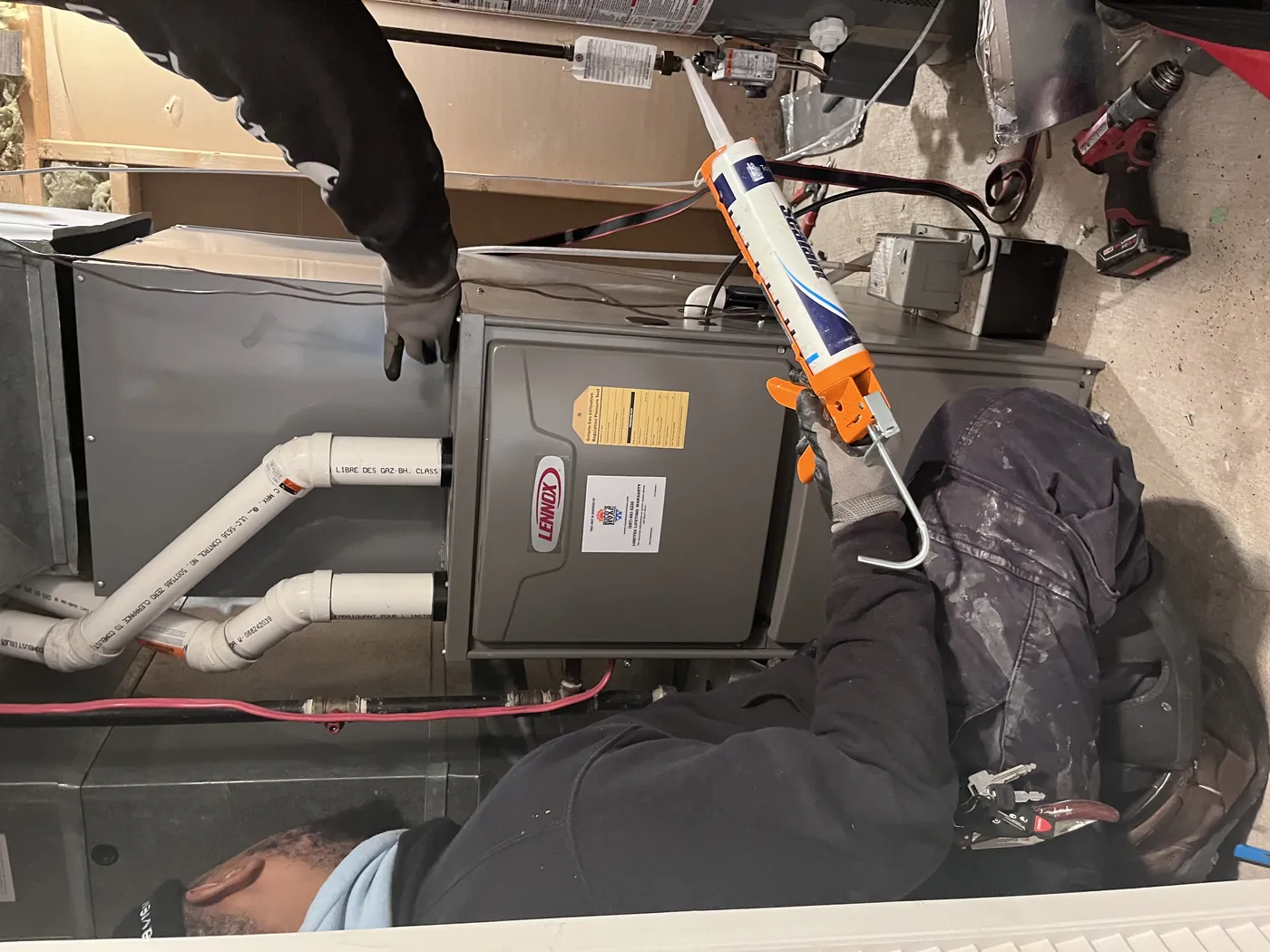 Rico's HVAC working on a furnace installation